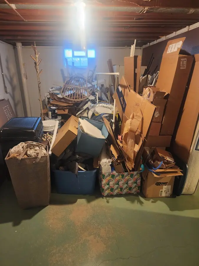 Roll-off dumpster container at job site for Construction Dumpster Rental in Hutchins